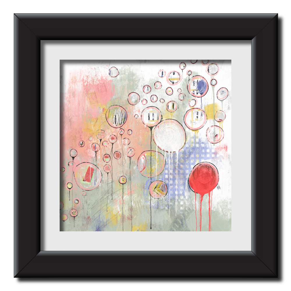 A playful abstract painting that evokes a sense of intricate complexity. Circles dominate the composition, rendered in soft shades of pink, yellow, red, blue, green, and white, with visible texture achieved through mixed media techniques. Fine lines emerge from some of the circles, creating a whimsical effect. A bright red circle, from which paint seems to ooze, draws the eye in the lower right corner, suggesting movement and energy. The overall impression is one of subtle depth and artistic exploration. In a modern black frame.